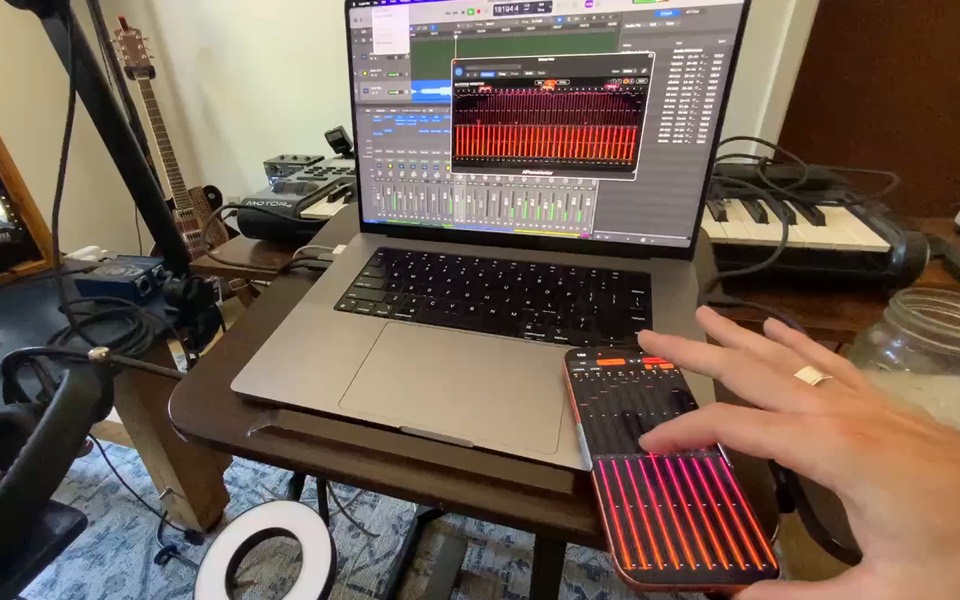 AIPHONE MONITOR open in Logic, with its headphone-mix faders on an iPhone